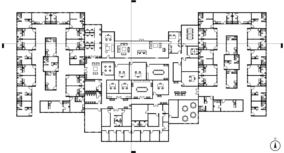 Floor plan — apartments at the perimeter, services at the core
