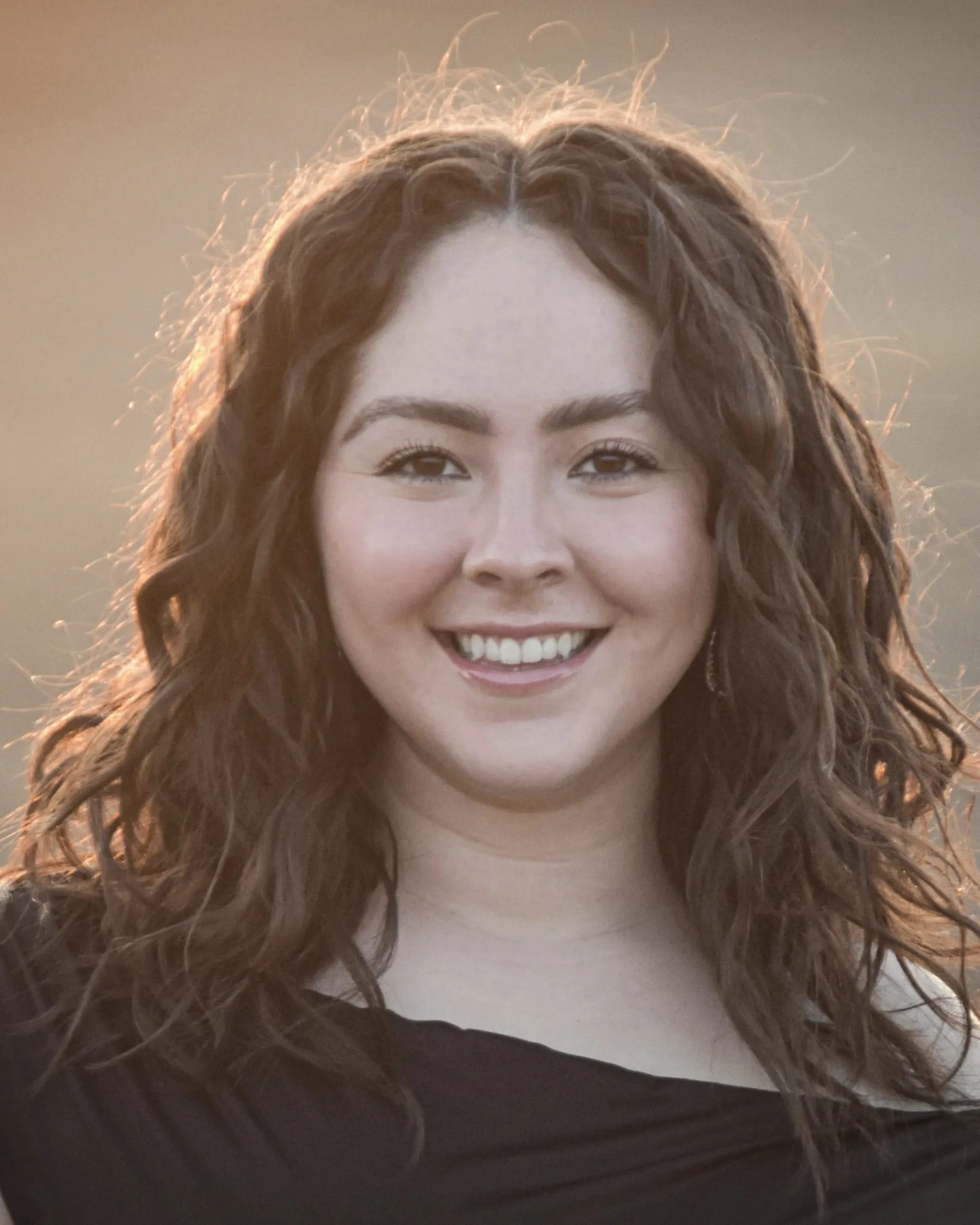 Portrait of Savannah N Scruggs — natural light, minimal background