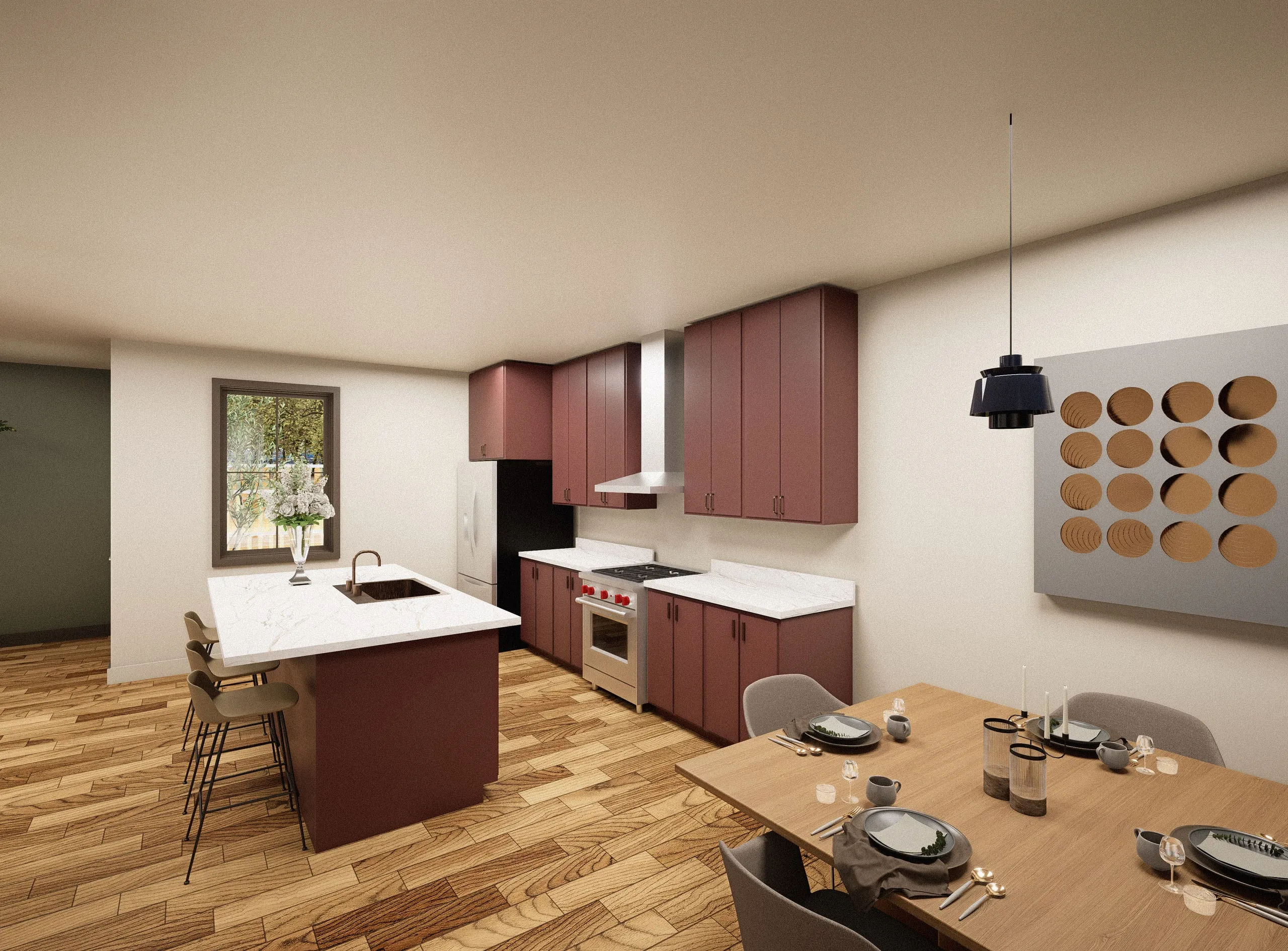 The Davis St House kitchen — an island and full-height cabinetry in deep oxblood red, white stone counters, warm wood floor